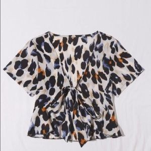 Plus size cheetah print crop top with front tie